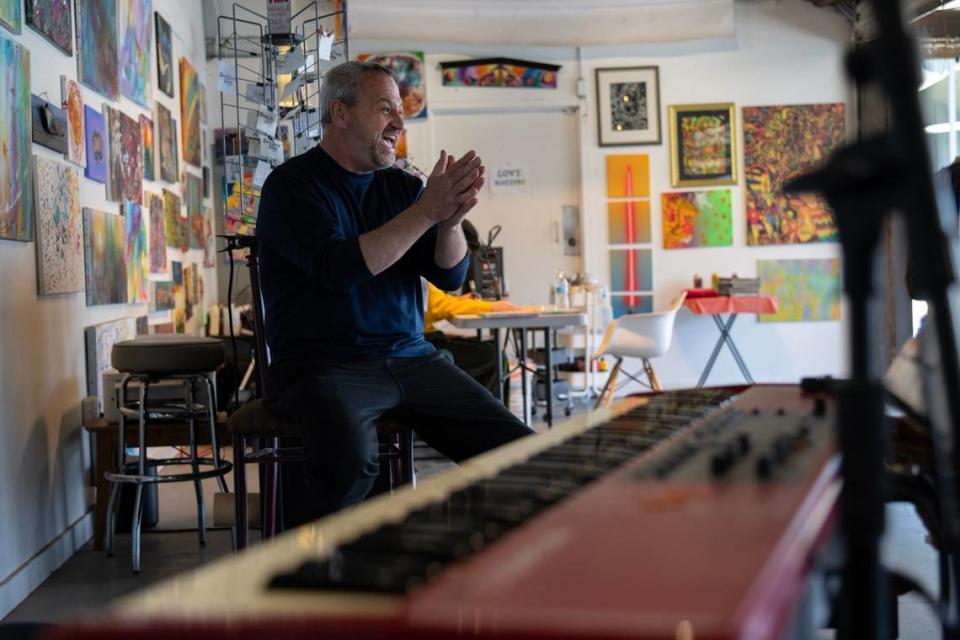 Dennis McBride sits in his business in Old Sacramento, Front Street Studios, earlier this month. He designed a place where musicians can show up and jam. A proposed building remodel could affect his indoor-outdoor studio space.