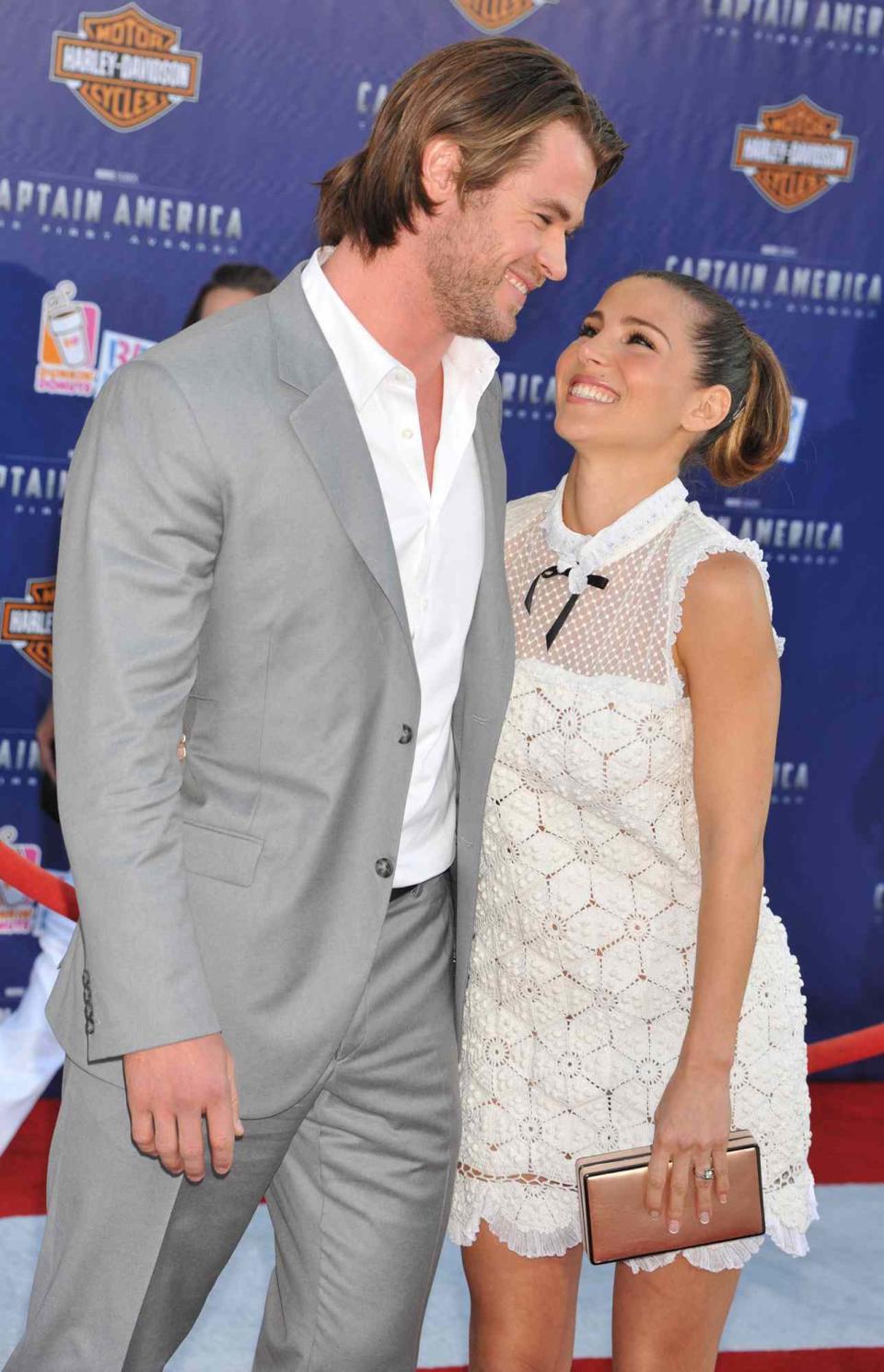 Actors Chris Hemsworth and Elsa Pataky arrive at the premiere of Paramount Pictures & Marvel Entertainment's "Captain America: The First Avenger" held at the El Capitan Theatre