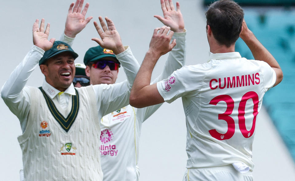 Pat Cummins, pictured here celebrating with Usman Khawaja after dismissing Heinrich Klaasen at the SCG.