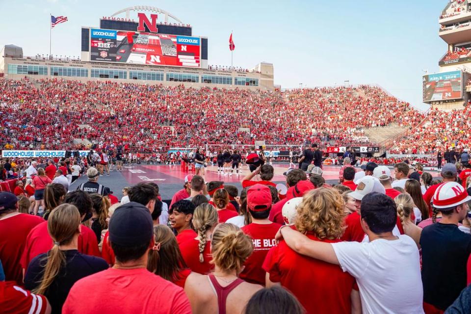 Fans watch as the Nebraska Cornhuskers and the Omaha Mavericks warmup before the game at Memorial Stadium.