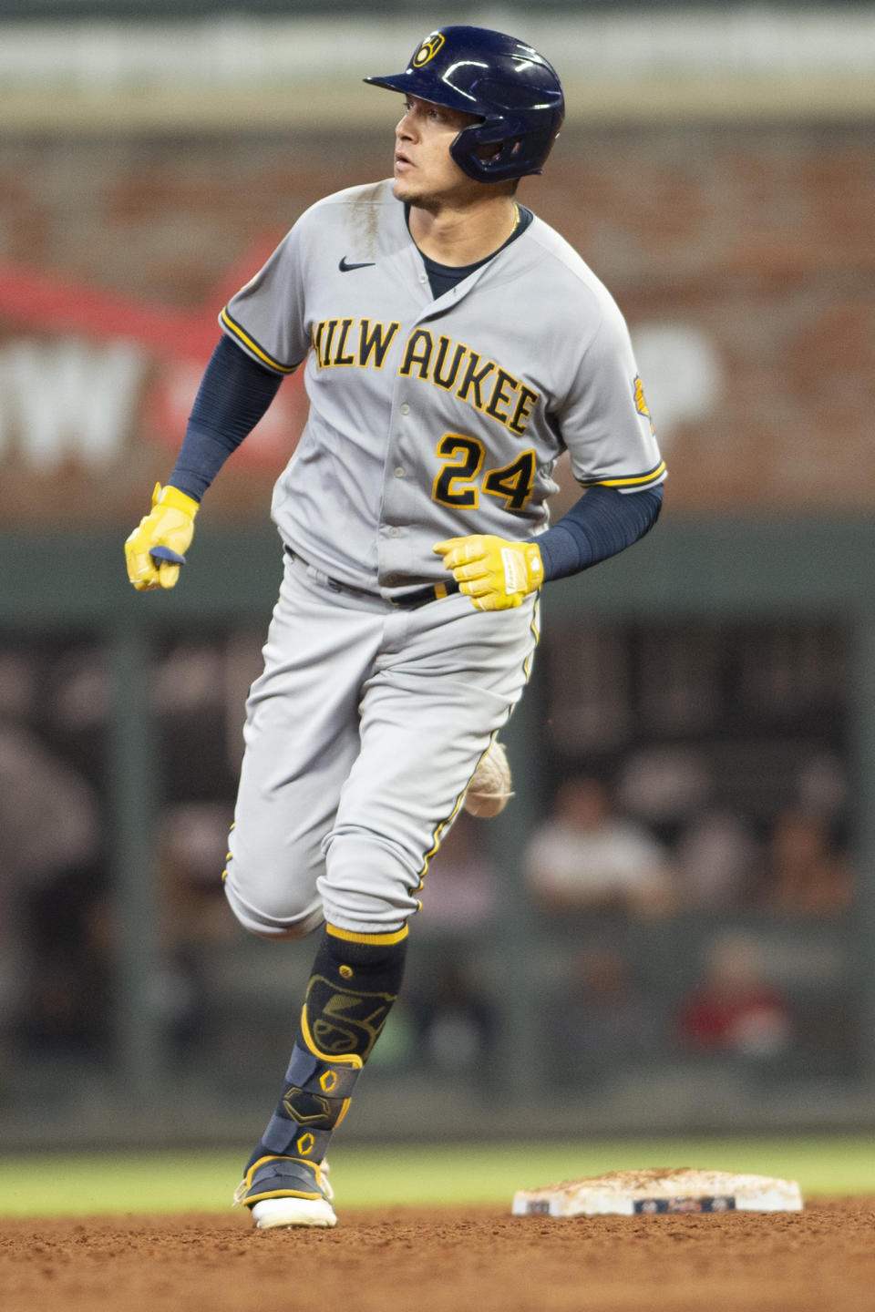 Milwaukee Brewers'' Avisail Garcia (24) rounds second base after hitting a two-run home run during the third inning of a baseball against the Atlanta Braves, Friday, July 30, 2021, in Atlanta. (AP Photo/Hakim Wright Sr.)