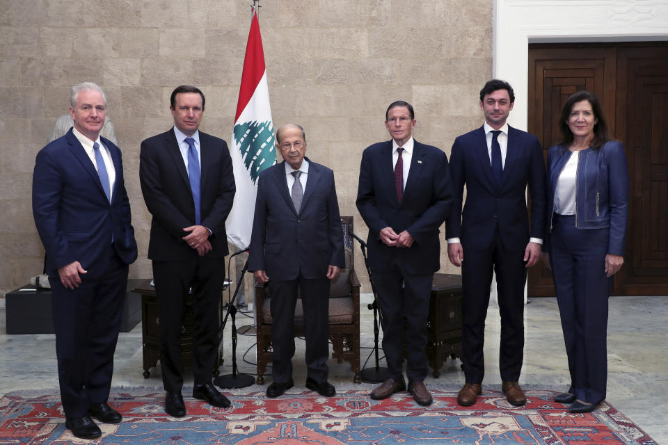 In this photo released by Lebanese government, Lebanese President Michel Aoun, third left, meets with Sen. Chris Murphy, D-C.T., second left, Sen. Chris Van Hollen, D-Md., left, Sen. Richard Blumenthal, D-C.T., third right, Sen. Jon Ossoff, D-Ga., second right, and U.S. Ambassador to Lebanon Dorothy Shea at the presidential palace, in Baabda, east of Beirut, Lebanon, Wednesday, Sept. 1, 2021. A delegation of four U.S. senators visiting Lebanon promised to work on easing Lebanon's crippling economic crisis. (Dalati Nohra/Lebanese Official Government via AP)