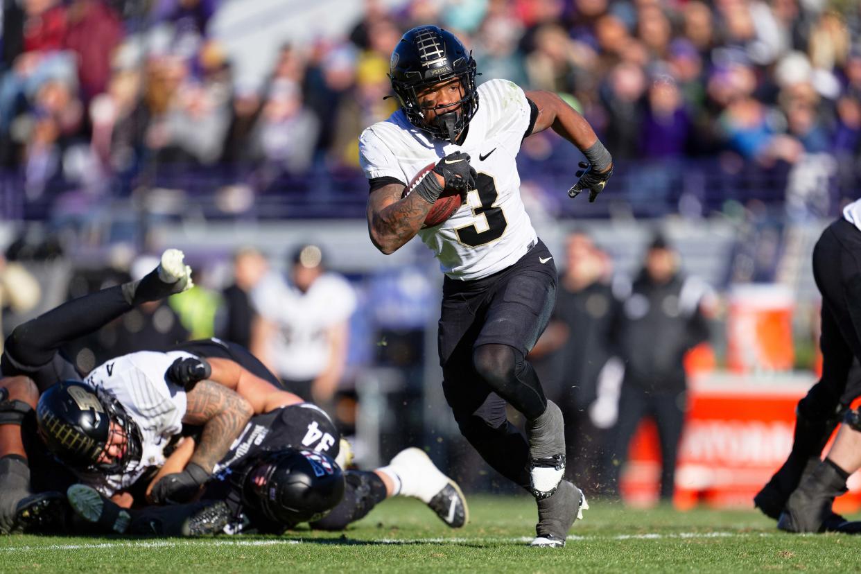 Nov 18, 2023; Evanston, Illinois, USA; Purdue Boilermakers running back Tyrone Tracy Jr. (3) runs with the ball against the Northwestern Wildcats at Ryan Field. Mandatory Credit: Jamie Sabau-USA TODAY Sports