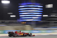 Ferrari driver Charles Leclerc of Monaco steers his car during the qualifying session for Sunday's Bahrain Formula One Grand Prix, at the Bahrain International Circuit in Sakhir, Bahrain, Saturday, March 27, 2021. The Bahrain Formula One Grand Prix will take place on Sunday. (AP Photo/Kamran Jebreili)