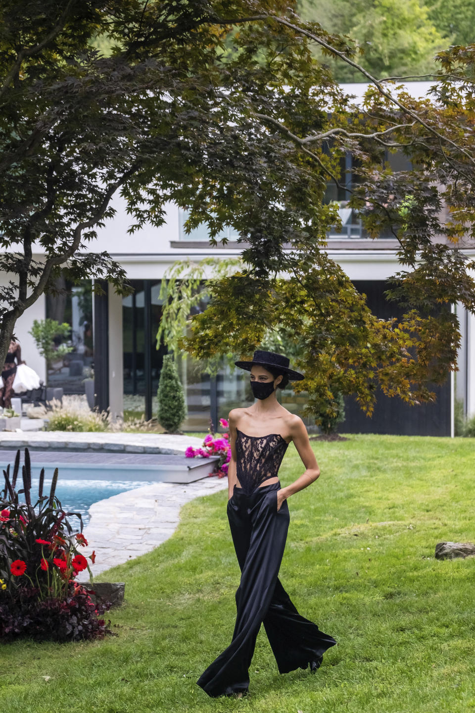 The Christian Siriano collection is modeled at Christian's home as part of New York Fashion Week, Thursday, Sept. 17, 2020, in Westport, Conn. (Photo by Charles Sykes/Invision/AP)