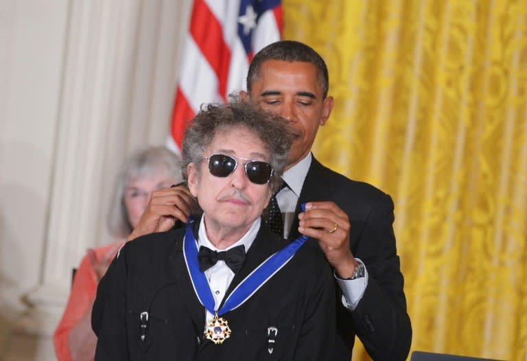 Bob Dylan, whose new album "Triplicate" comes out March 31, is shown here receiving the Presidential Medal of Freedom during a 2012 White House ceremony