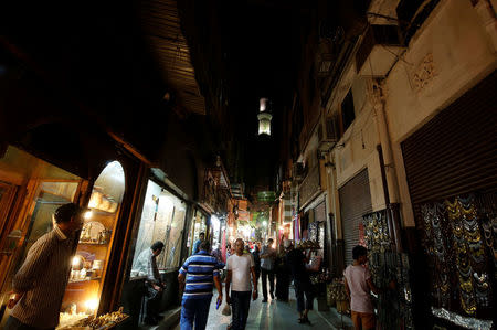 Vendors wait for customers in a popular tourist area named "Khan el-Khalili" at al-Hussein and Al-Azhar districts in old Islamic Cairo, Egypt August 18, 2016. Picture taken August 18, 2016. REUTERS/Amr Abdallah Dalsh