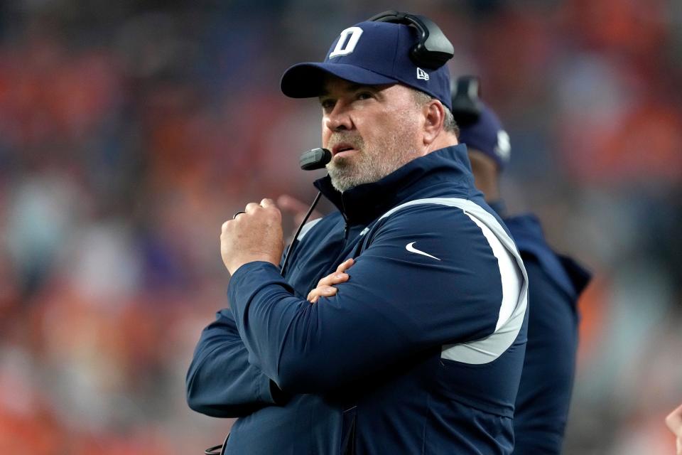 Dallas Cowboys head coach Mike McCarthy watches during the first half of an NFL preseason football game against the Denver Broncos, Saturday, Aug. 13, 2022, in Denver.