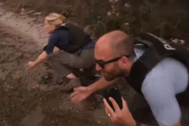 <p>CNN/YouTube</p> CNN's Clarissa Ward and her team duck for cover as missiles fly overhead near the Gaza-Israel border