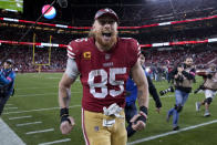 San Francisco 49ers tight end George Kittle (85) celebrates after an NFL divisional round playoff football game against the Dallas Cowboys in Santa Clara, Calif., Sunday, Jan. 22, 2023. (AP Photo/Tony Avelar)
