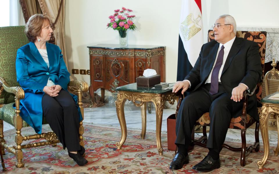 This photograph released by the Delegation of European Union in Egypt shows European Union foreign policy chief Catherine Ashton, left, meeting with Egypt's Interim President Adly Mansour in Cairo, Egypt, Thursday, April 10, 2014.(AP Photo/Pedro Luis Costa Gomes)