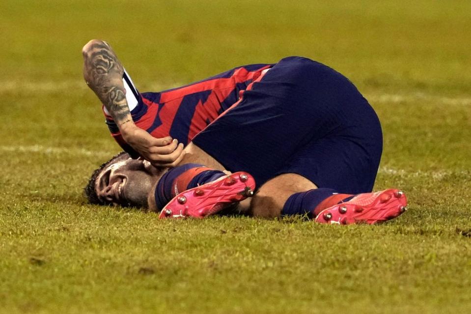 Christian Pulisic was injured during the USA’s win over Honduras  (AP)