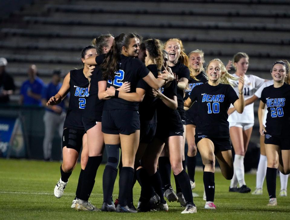 Bartram Trail players celebrate winning the Class 7A Girls Soccer Championship match 3-0 over Boca Raton at Spec Martin Stadium in DeLand, Friday, Feb. 24, 2023 