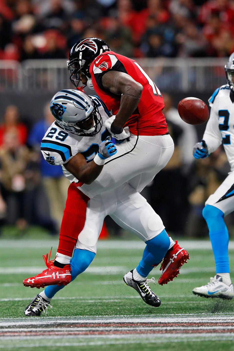 <p>Julio Jones #11 of the Atlanta Falcons fails to make a catch after being hit by Mike Adams #29 of the Carolina Panthers during the first half at Mercedes-Benz Stadium on December 31, 2017 in Atlanta, Georgia. (Photo by Kevin C. Cox/Getty Images) </p>