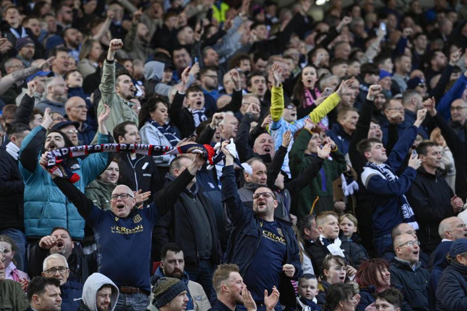 Dundee fans celebrate securing top six in the Scottish Premiership <i>(Image: SNS)</i>