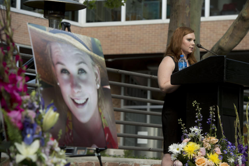 FILE - In this July 1, 2019, file photo, Ashley Fine speaks during a vigil for Mackenzie Lueck at the university in Salt Lake City. A tech worker pleaded guilty Wednesday, Oct. 7, 2020, in the death of Lueck, more than a year after her disappearance sparked a large-scale search that ended with the discovery of her charred remains in his backyard. Ayoola A. Ajayi is expected to be sentenced to life in prison without the possibility of parole. (Jeremy Harmon/The Salt Lake Tribune via AP, File)