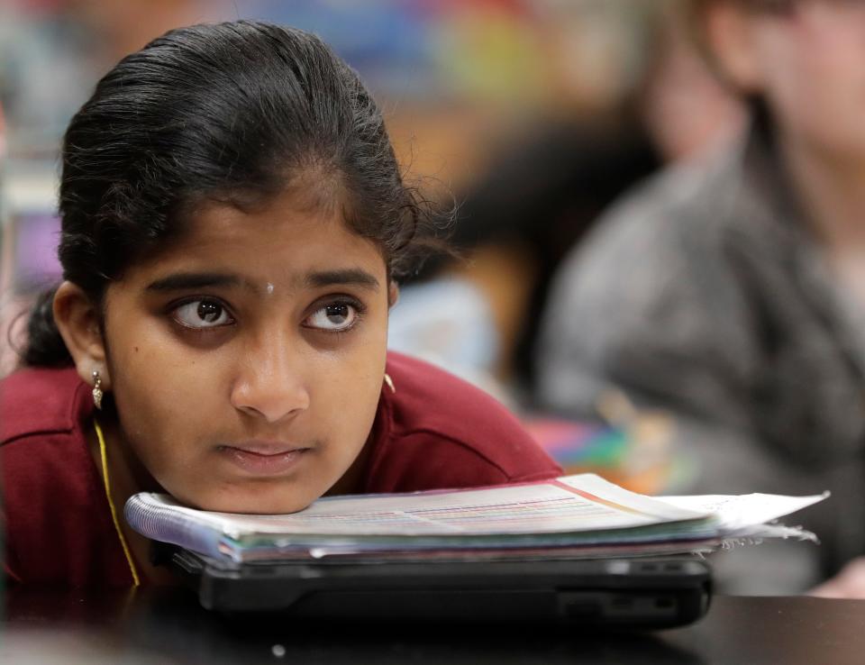 Fox River Academy sixth-grader Madhumathi Sankar focuses during the classroom portion of an outdoor observation activity March 14 at Pierce Park in Appleton.