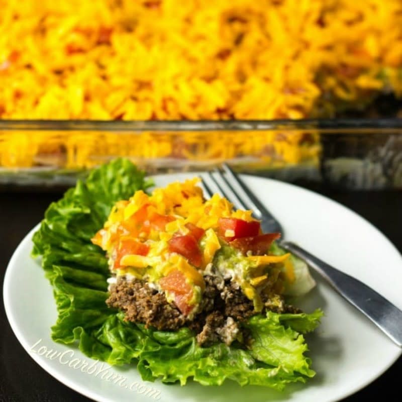 <p>Served as a salad topping or for dipping tortilla chips, you’ll love the flavors in this layered taco salad dip.</p><p><strong>Get the recipe:</strong><a href="https://lowcarbyum.com/layered-taco-salad-dip-with-ground-beef/" rel="nofollow noopener" target="_blank" data-ylk="slk:Layered Taco Salad Dip with Ground Beef;elm:context_link;itc:0;sec:content-canvas" class="link ">Layered Taco Salad Dip with Ground Beef</a></p>