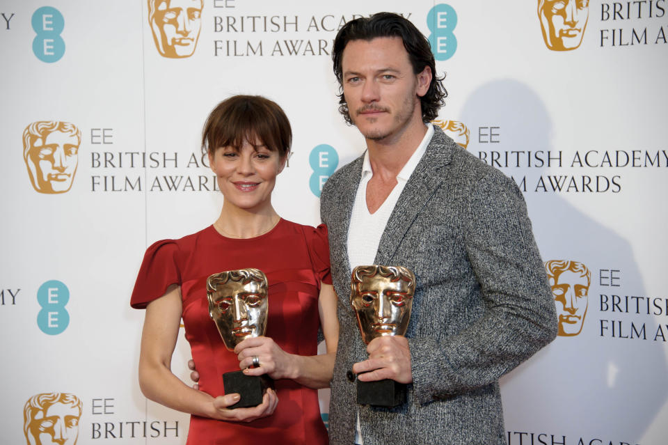 British actors Helen McCrory, left, and Luke Evans pose for photographers ahead of the EE British Academy Film Awards Nominations announcement in London, Wednesday, Jan. 8, 2014. (Photo by Jonathan Short/Invision/AP)