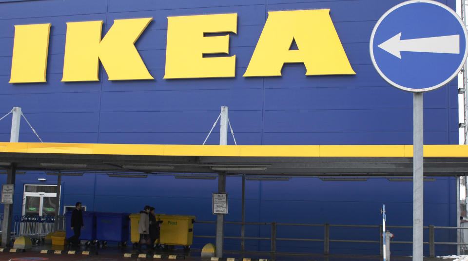 People walk alongside an IKEA outlet in Prague, February 25, 2013.  Swedish furniture giant IKEA said on Monday it has stopped selling meatballs from a specific batch which has tested positive for traces of horsemeat by Czech authorities. REUTERS/Petr Josek (CZECH REPUBLIC - Tags: BUSINESS FOOD POLITICS)