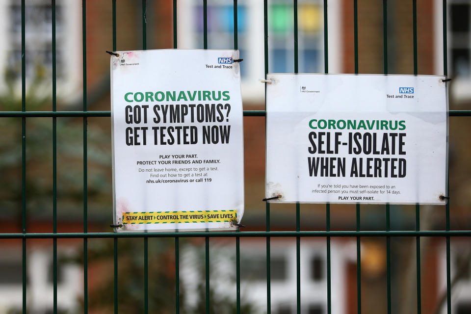 LONDON, ENGLAND - JANUARY 10: NHS Test and Trace notices displayed outside King Solomon Academy in Westminster on January 10, 2021 in London, England. England is expanding rapid 