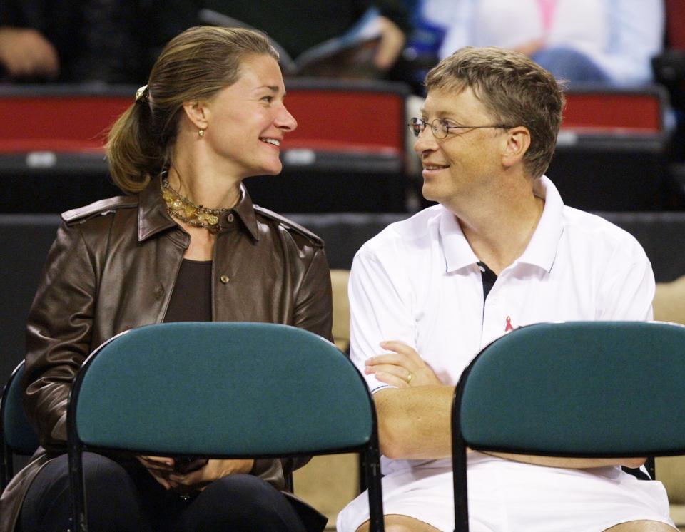 Bill Gates and his wife Melinda Gates attend the Schick XTreme III Tennis Challenge October 7, 2001 at the Key Arena in Seattle, WA. (Photo by Jeff Vinnick/Allsport/Getty Images)