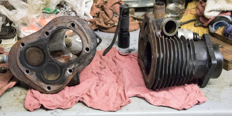 A pair of side-valve cylinders. You can clearly see the intake and exhaust valves next to the cylinder bore.