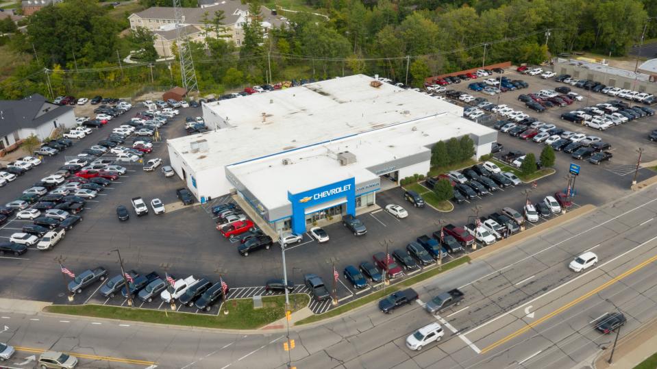 An aerial photo of Bowman Chevrolet in Clarkston on May 3, 2021. The store only has about a third of the new car inventory it would usually have because of a semiconductor chip shortage that has caused GM and other automakers to halt some production.
