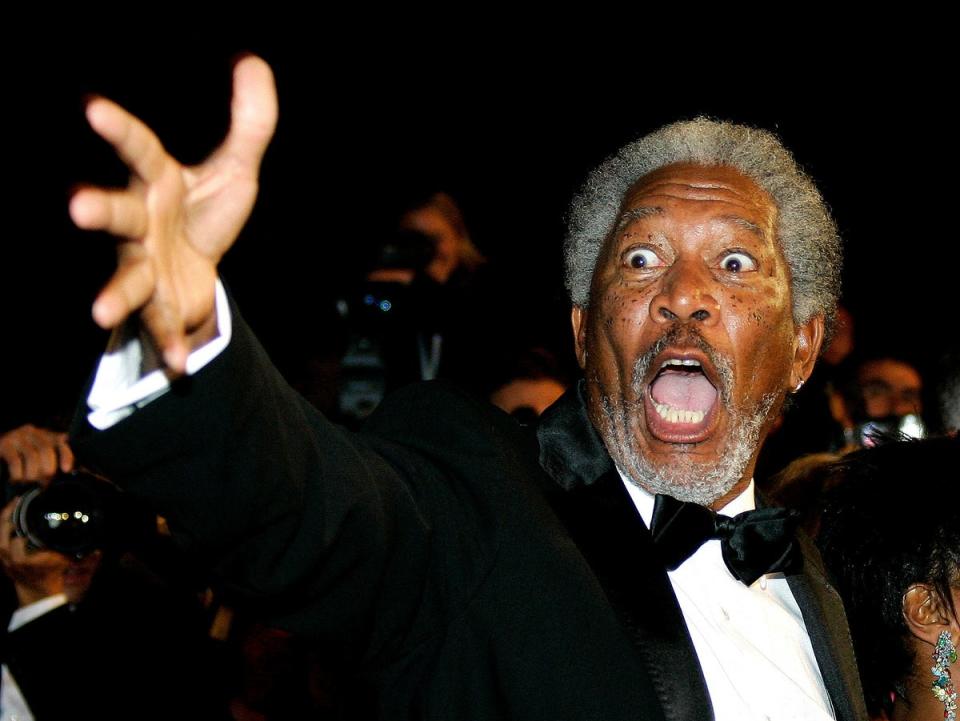 Morgan Freeman poses as he arrives on the red carpet for Robert Rodriguez and Frank Miller’s film ‘Sin City’ at the 58th Cannes on 18 May 2005 (Reuters)