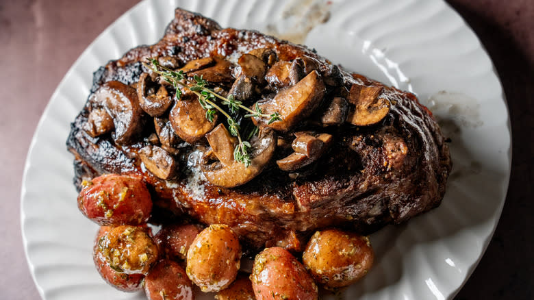 Thick steak with mushrooms