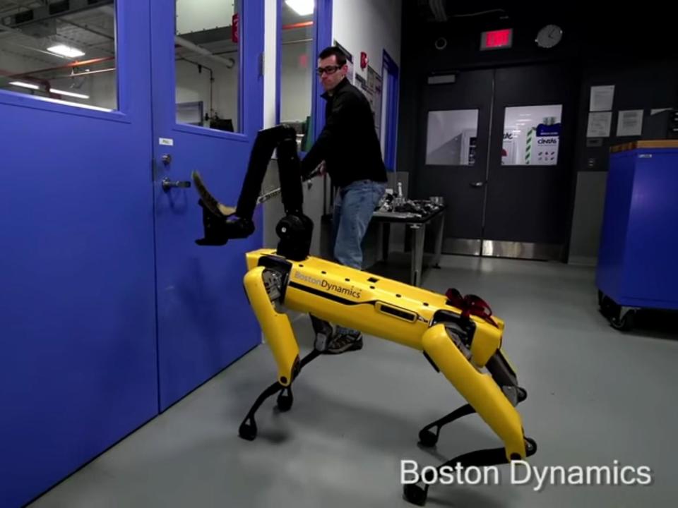 Boston Dynamics robot fights back against armed man to open door and enter room