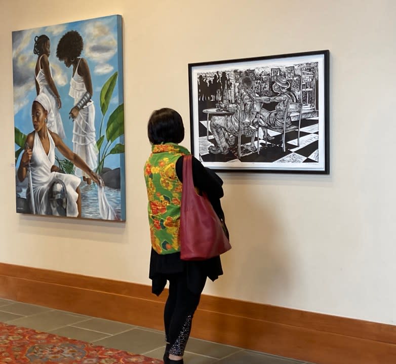 The 2022 Black Artist Showcase featured “Ezra: Reparations Groove,” a linoleum cut by Steve Prince (at right), as well as “The Calm,” an acrylic painting by S. Ross Browne. Jamestown-Yorktown Foundation photo.