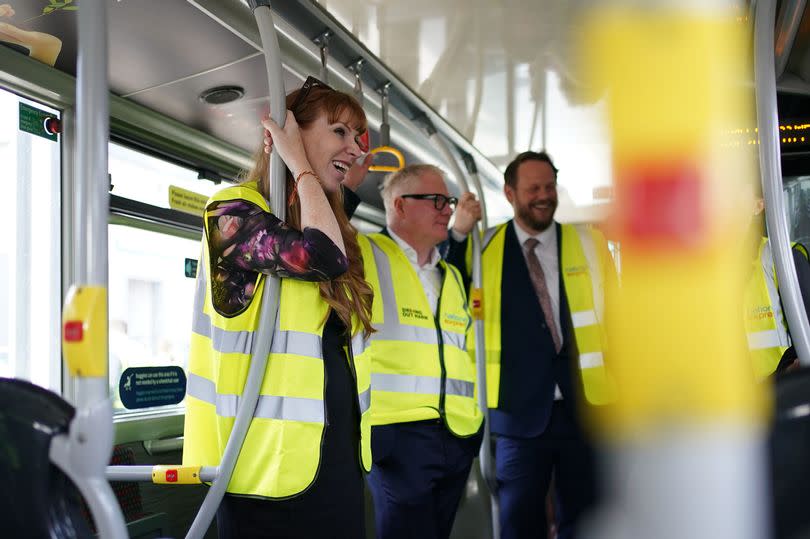 Labour Party deputy leader Angela Rayner and Richard Parker, (centre) Labour's West Midlands mayoral candidate, during a visit to Perry Barr bus depot. -Credit:PA