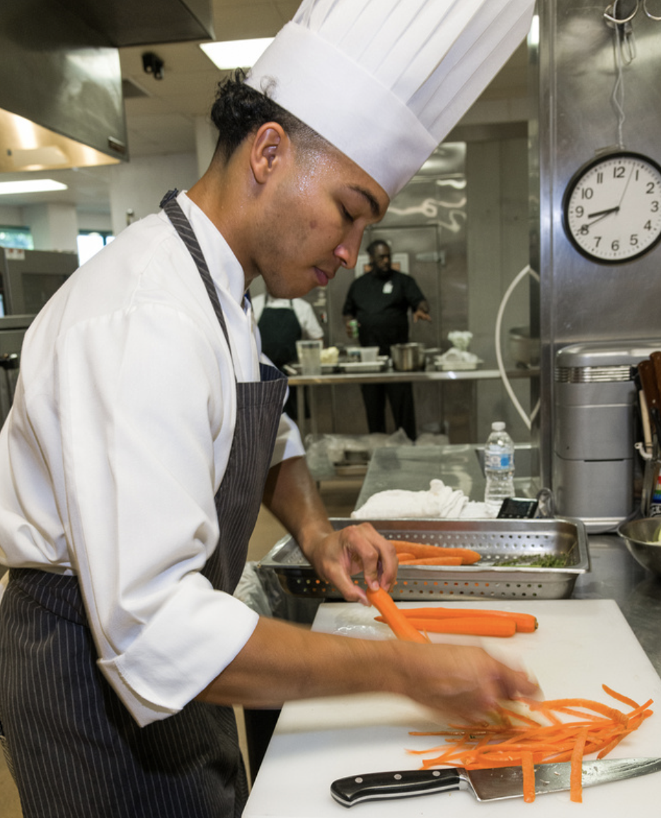 Chef Torian Jenkins competes in the 2022 Jeunes Chefs Rotisseurs Competition in Atlanta. Jenkins was the regional winner of the Southwest Province in 2022.