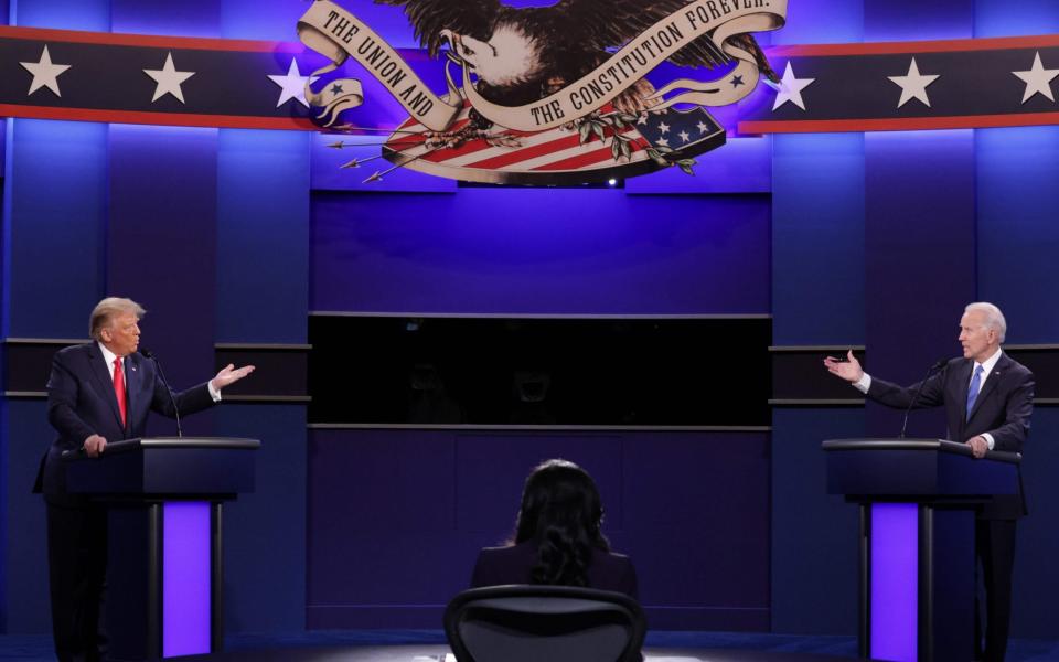 President Donald Trump (L), Democratic Presidential candidate former US Vice President Joe Biden and moderator, NBC News anchor, Kristen Welker (C) participate in the final presidential debate at Belmont University - AFP