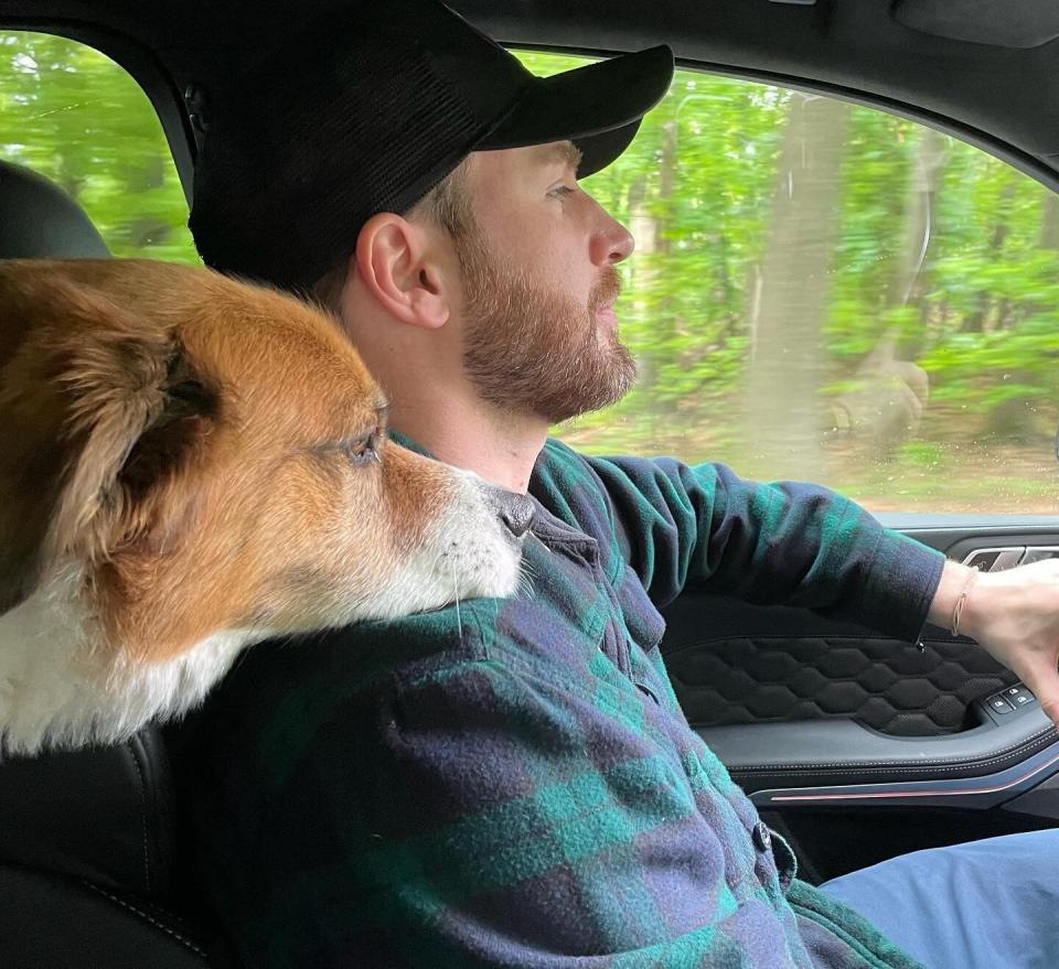 Chris Evans Celebrates National Rescue Dog Day with Adorable Picture of Himself and Pet Dodger. https://www.instagram.com/p/CdzBf79rfCv/.