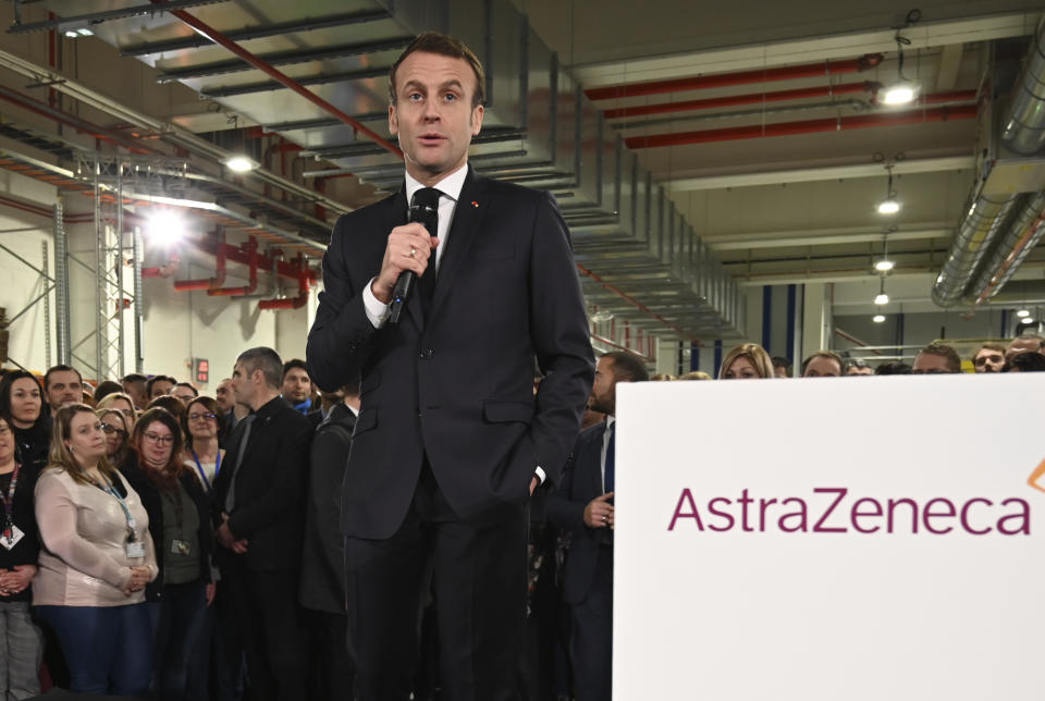 French President Emmanuel Macron delivers a speech as he visits a plant of British-Swedish pharmaceutical group Astrazeneca in Dunkirk, northern France, Monday, Jan. 20, 2020. French President Emmanuel Macron is hosting 180 international business leaders later today at the Palace of Versailles in a bid to promote France's economic attractiveness despite over six weeks of crippling strikes over his government's planned pension changes.(Denis Charlet/Pool Photo via AP)