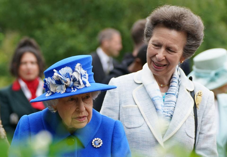 Queen Elizabeth II was accompanied by her only daughter, Princess Anne the Princess Royal, when she visited the Children's Wood Project in Glasgow on June 30, 2021, as part of her traditional trip to Scotland for Royal Week.