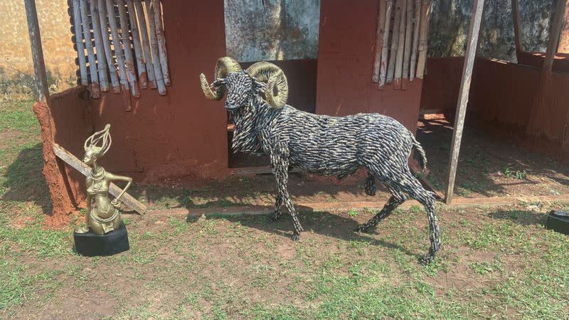 An artwork of a ram made of sparks plugs is seen displayed during the unveiling of Lucas Osarobo- Okoro's largest bronze plaque in Benin