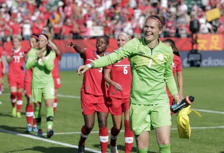 Jun 6, 2015; Edmonton, Alberta, CAN; Canada goalkeeper Erin McLeod (1) celebrates after defeating China 1-0 in a Group A soccer match in the 2015 women's World Cup at Commonwealth Stadium. Erich Schlegel-USA TODAY Sports