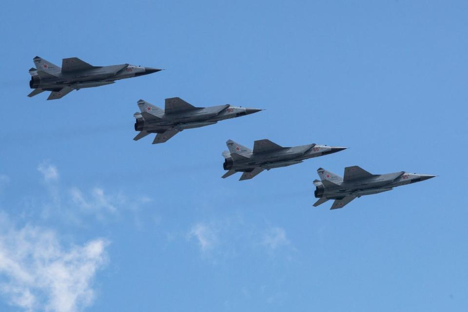 Russian MiG-31K jets carry Kh-47M2 Kinzhal ballistic missiles (AP Photo)