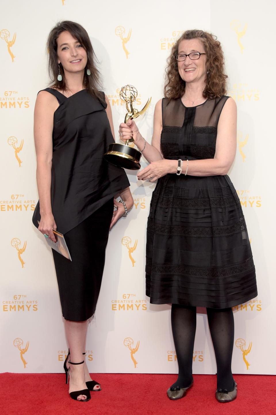 Meredith Tucker, left, and Allison Jones, winners of Oustanding Casting for a Comedy Series for "Veep," pose in the press room during the 2015 Creative Arts Emmy Awards at Microsoft Theater on Sept. 12, 2015, in Los Angeles.