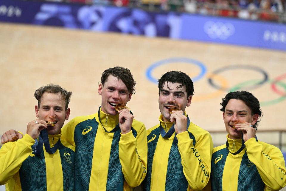 Sam Welsford, Australia's Kelland O'brien, Australia's Conor Leahy and Oliver Bleddyn pose with their gold medals.