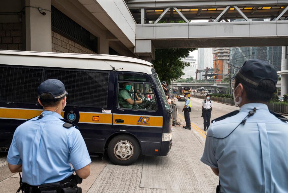 A Correction Services Department van thought to carry Tong Ying-kit, convicted under the Hong Kong National Security Law, leaves the High Court in Hong Kong (EPA)