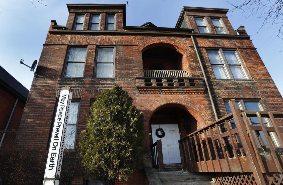 Freedom House is shown, Friday, Feb. 10, 2017, in Detroit. Freedom House, based in a former convent on the grounds of Detroit's oldest parish and overlooking the river that separates Detroit from the Canadian city of Windsor, continues to ease the fears of asylum seekers from across the globe. (AP Photo/Paul Sancya)