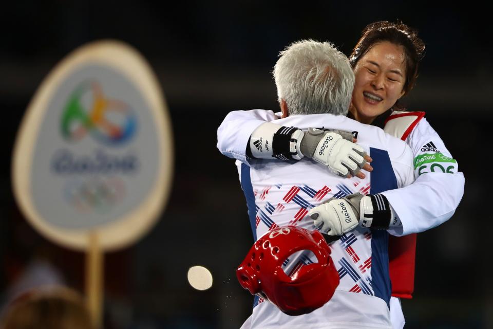 <p>Hyeri Oh of South Korea celebrates winning the Women’s Taekwondo -67kg Gold Medal Contest match against Haby Niare of France on Day 14 of the Rio 2016 Olympic Games at Carioca Arena 3 on August 19, 2016 in Rio de Janeiro, Brazil. (Photo by Dean Mouhtaropoulos/Getty Images) </p>