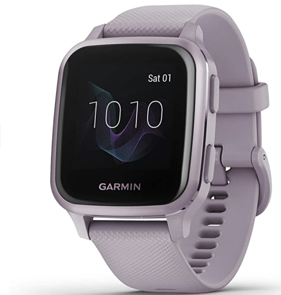 Garmin Venu Sq, GPS Smartwatch with Bright Touchscreen Display is in purple and shows the time as 1010 in digital format.