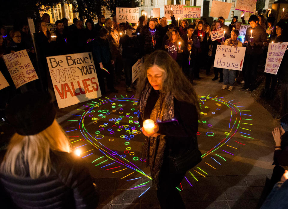 Anti-Trump protesters gather as Electoral College votes