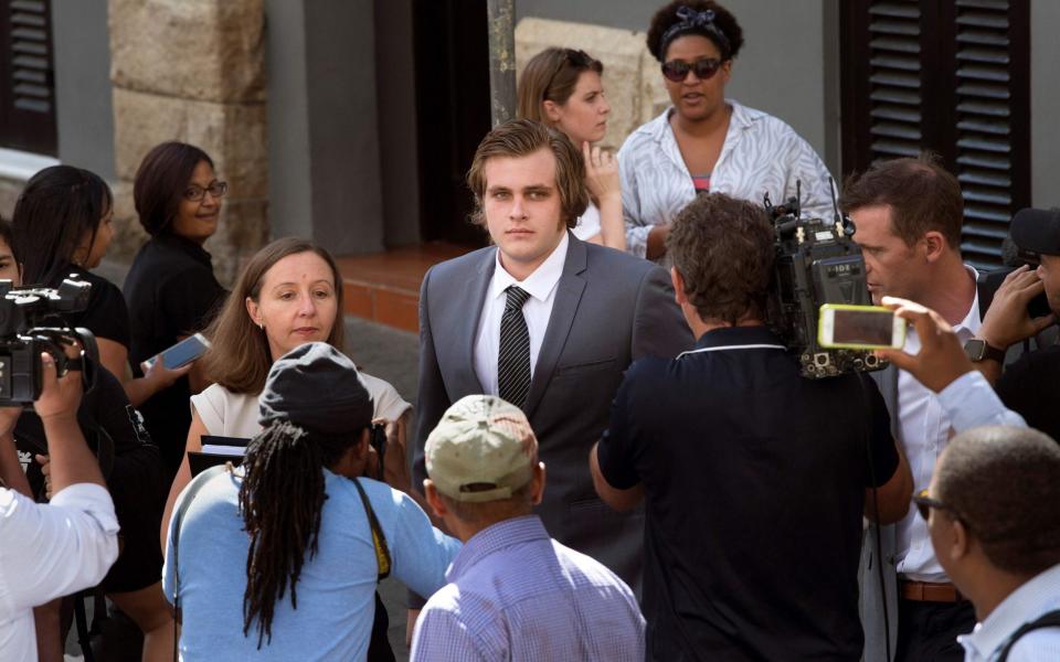 Henri van Breda arriving with his lawyer Lorinda van Niekerk at the Western Cape High Court  - Credit:  RODGER BOSCH/AFP