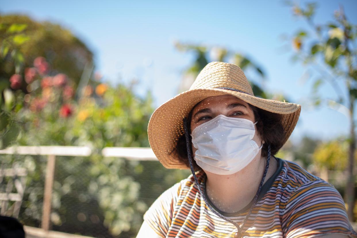 Sarah works in her community garden on Saturday, September 25, 2021.